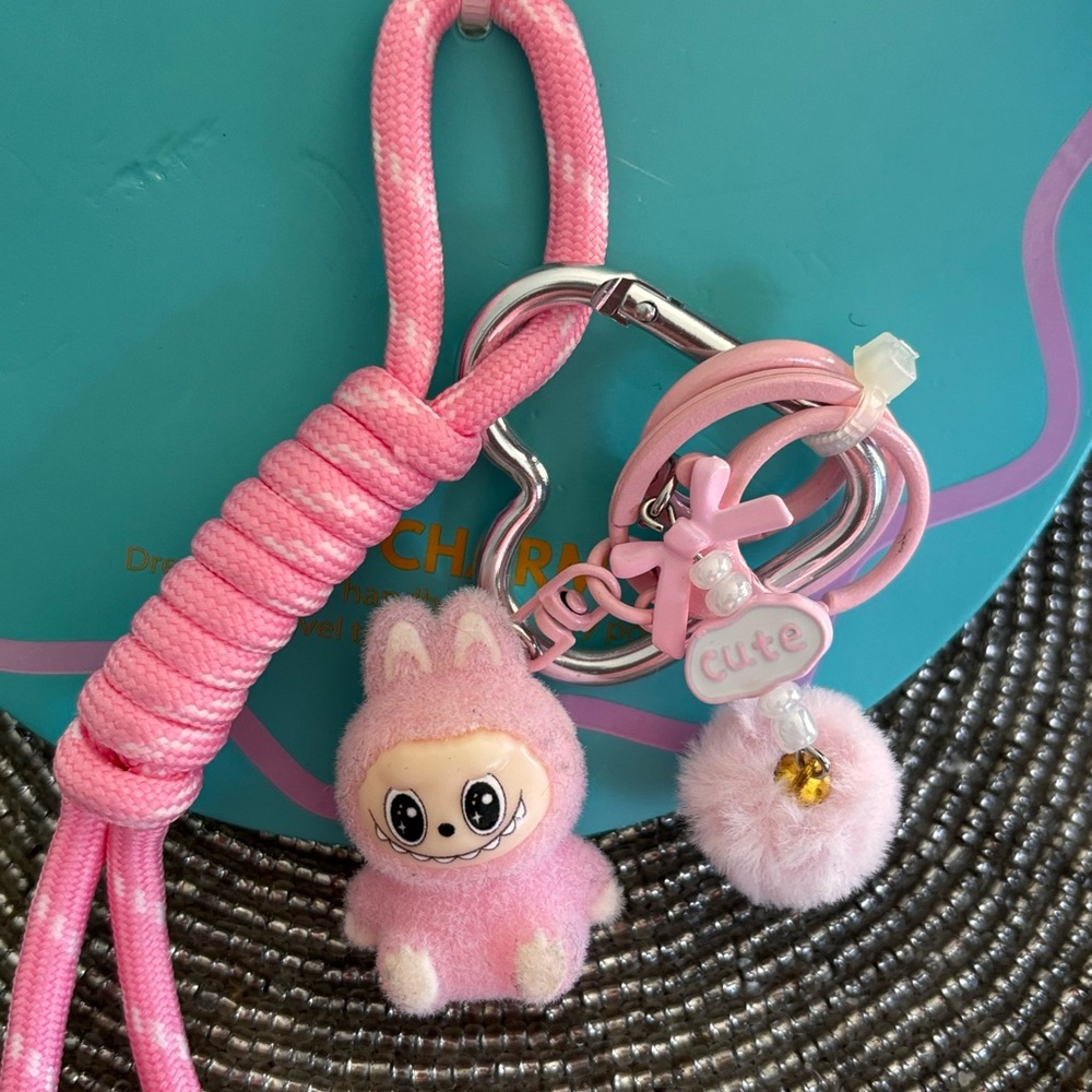 Cute Lulla Collection Bag Charm Pink with Pom-Pom Accent